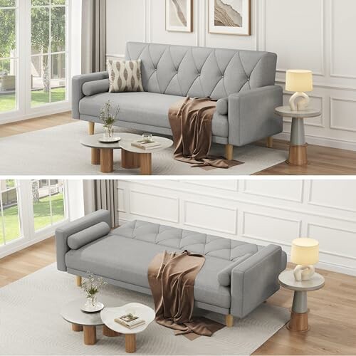 Gray sofa bed in living room with side tables and decor.