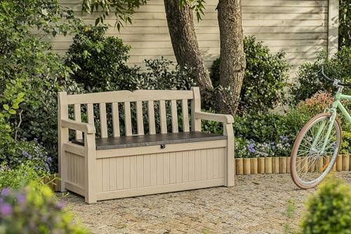 Wooden garden bench with storage in a lush garden setting.